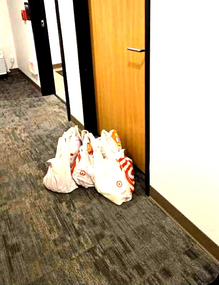 Grocery bags at hotel room door